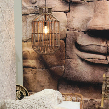 Rustic woven pendant light against an ancient stone wall, bringing a touch of cultural and cozy decor to the room.