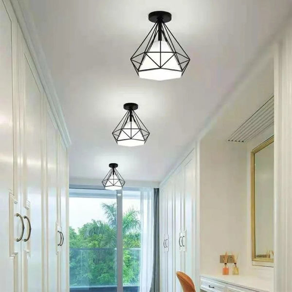 Three black Orbis lights staged in closet interior.