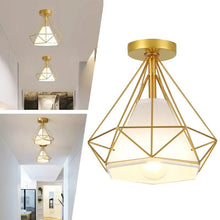 Robin gold ceiling light installed in white hallway.
