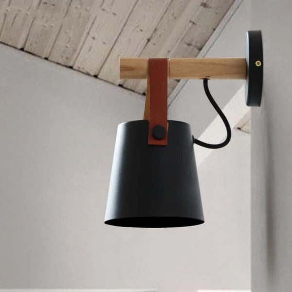 Black Celora Wooden Wall Light in an industrial-style interior