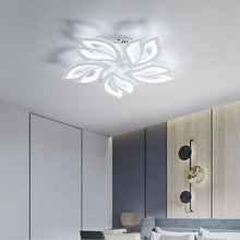 FLORA LED ceiling light installed in a stylish bedroom, providing soft and uniform illumination.