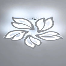 FLORA LED ceiling light with a modern floral design, emitting bright white light, perfect for contemporary interiors.