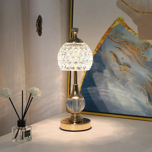 Gold acrylic touch table lamp with stepless dimming and elegant design for modern interiors.