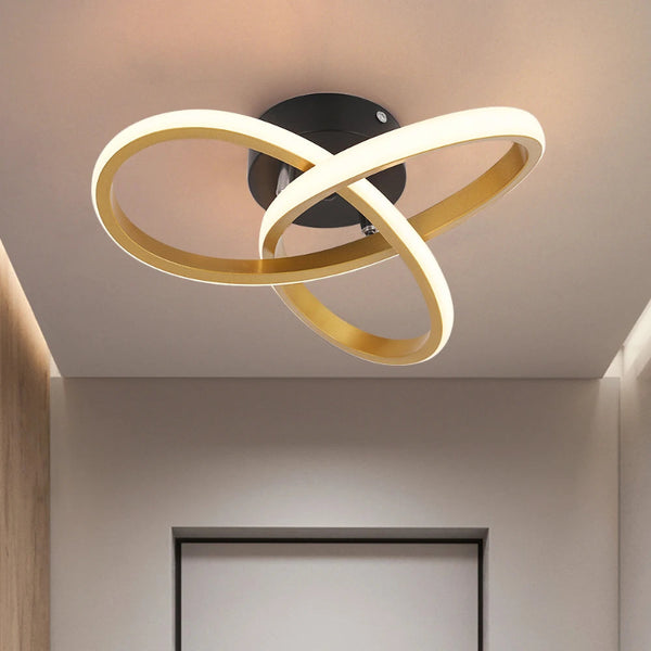 Elegant gold LED ceiling lamp with a minimalist and energy-efficient design, ideal for brightening up contemporary interiors.