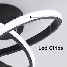 Close-up of the energy-saving LED strips on the APTEL black ceiling lamp, highlighting its sleek and modern finish.