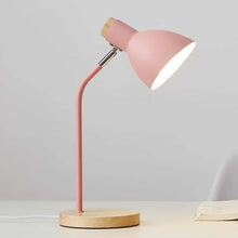 Elegant pink Lesko Desk Lamp with a matte finish, combining a contemporary design with functional task lighting.