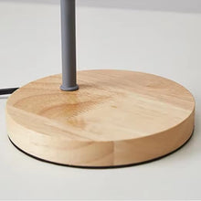 Detailed view of the wooden base on the Lesko Desk Lamp, providing stability and a natural aesthetic to modern interiors.