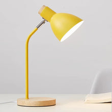 Lesko Desk Lamp in yellow with a sleek metal frame and natural wooden base, perfect for workspaces and bedside tables.