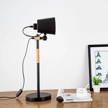 Close-up of the LOFT1 Desk Lamp’s adjustable head for directional lighting control.