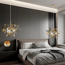 Luxury gold chandeliers hanging above a modern bedroom, providing a warm and stylish lighting solution for a sophisticated interior.