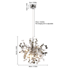 A dimension breakdown of a silver modern ceiling chandelier, showcasing adjustable height and fixture size.