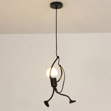 A single Iron Little Man Ceiling Lamp hanging from the ceiling, showing its unique metal design and sturdy installation.