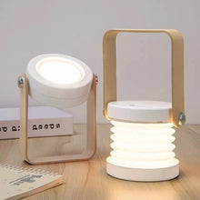 TrailOrb 4-in-1 Folding Lamp in white, shown in both spotlight and lantern modes on a modern desk.