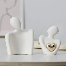 Minimalist white ceramic couple statue in two separate pieces, symbolizing love and connection, perfect for home decor.